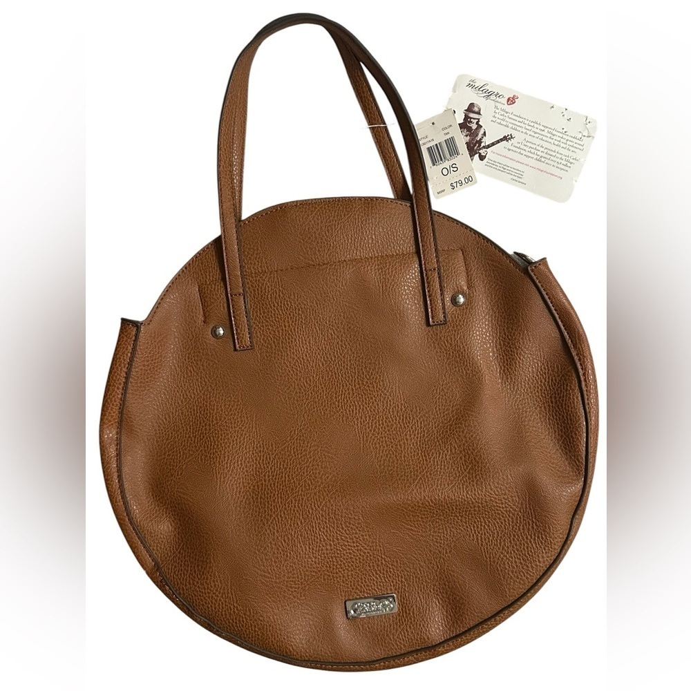 Carlos by Carlos Santana tan circular handbag